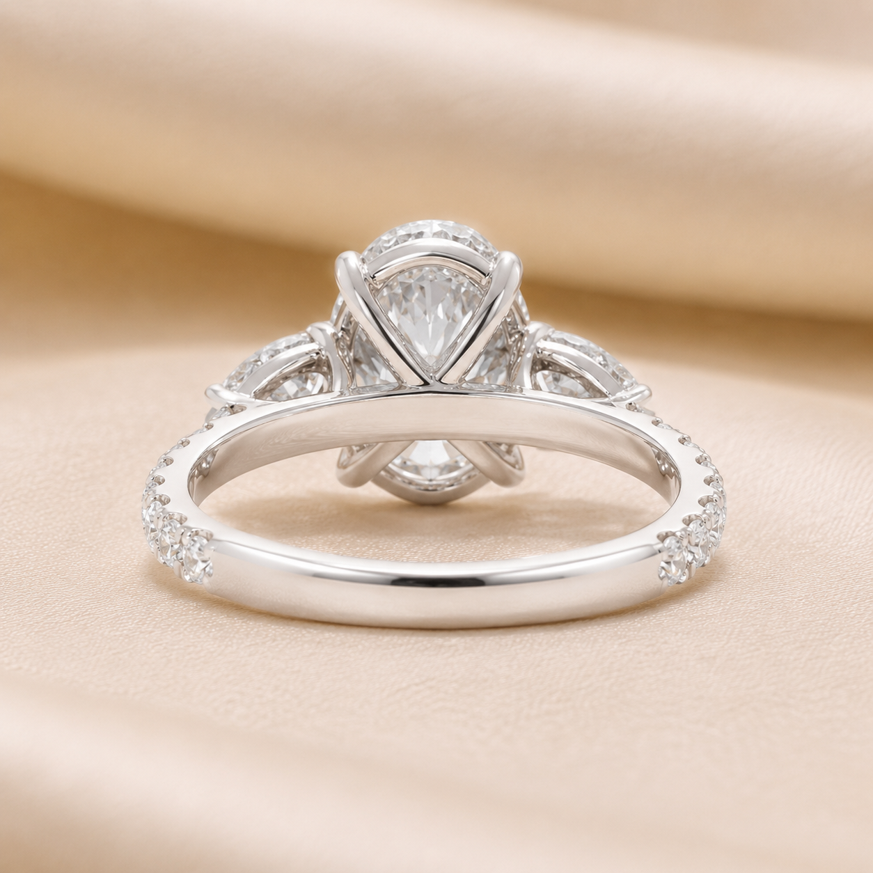 3.00 CT Oval Lab-Grown Diamond Three-Stone Engagement Ring in 14K White Gold – Pear Side Stone Pavé Trilogy Design