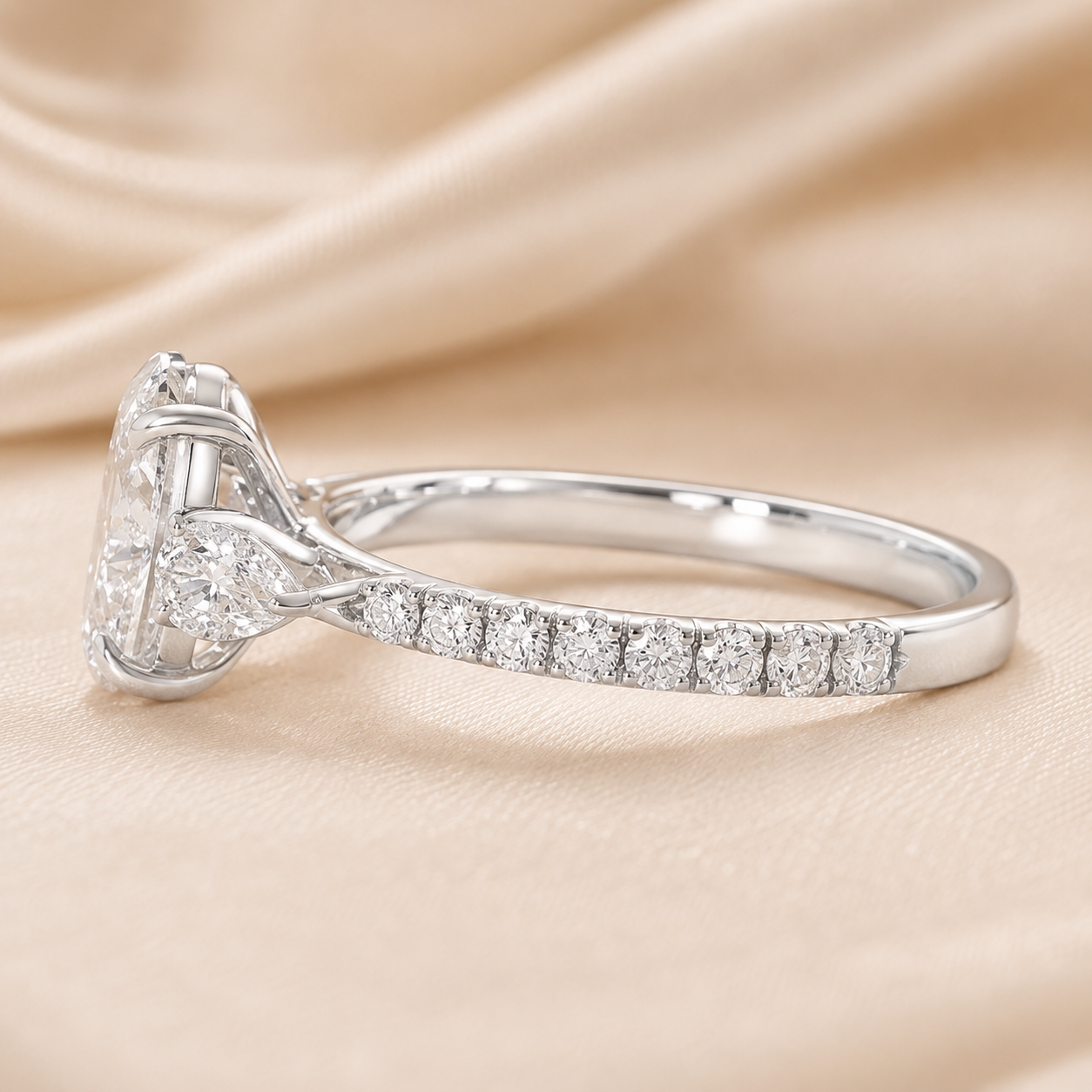 3.00 CT Oval Lab-Grown Diamond Three-Stone Engagement Ring in 14K White Gold – Pear Side Stone Pavé Trilogy Design