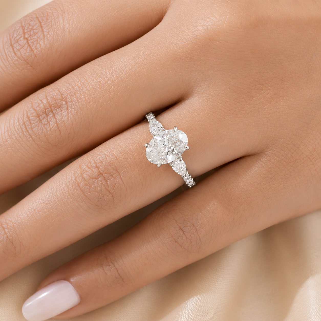 3.00 CT Oval Lab-Grown Diamond Three-Stone Engagement Ring in 14K White Gold – Pear Side Stone Pavé Trilogy Design
