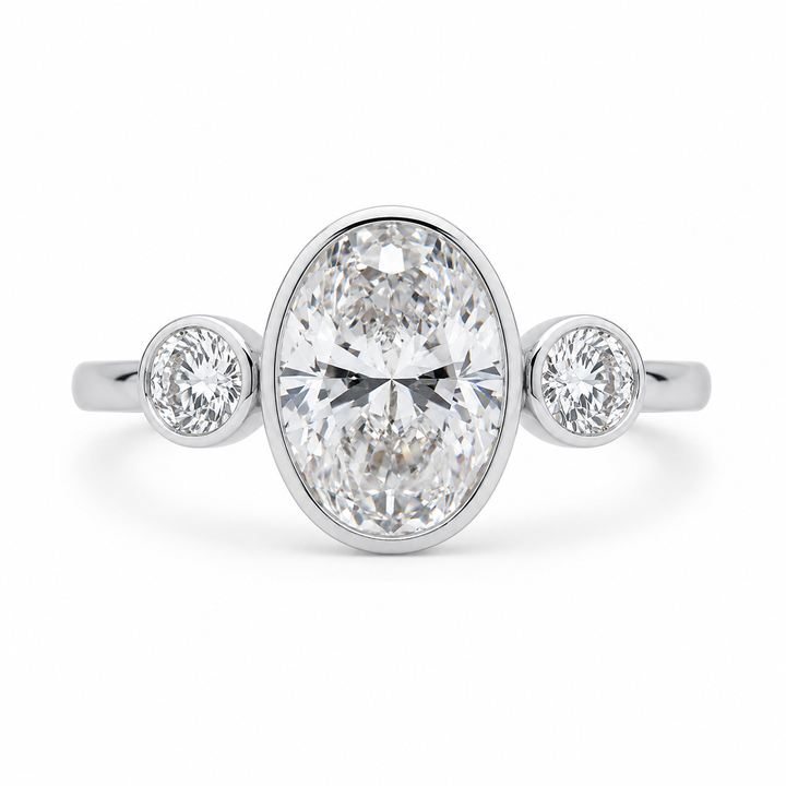 2.00 CT Oval Cut Lab-Grown Diamond Three-Stone Engagement Ring in 14K White Gold â€“ Bezel Set Trilogy Design from Diamond Studio