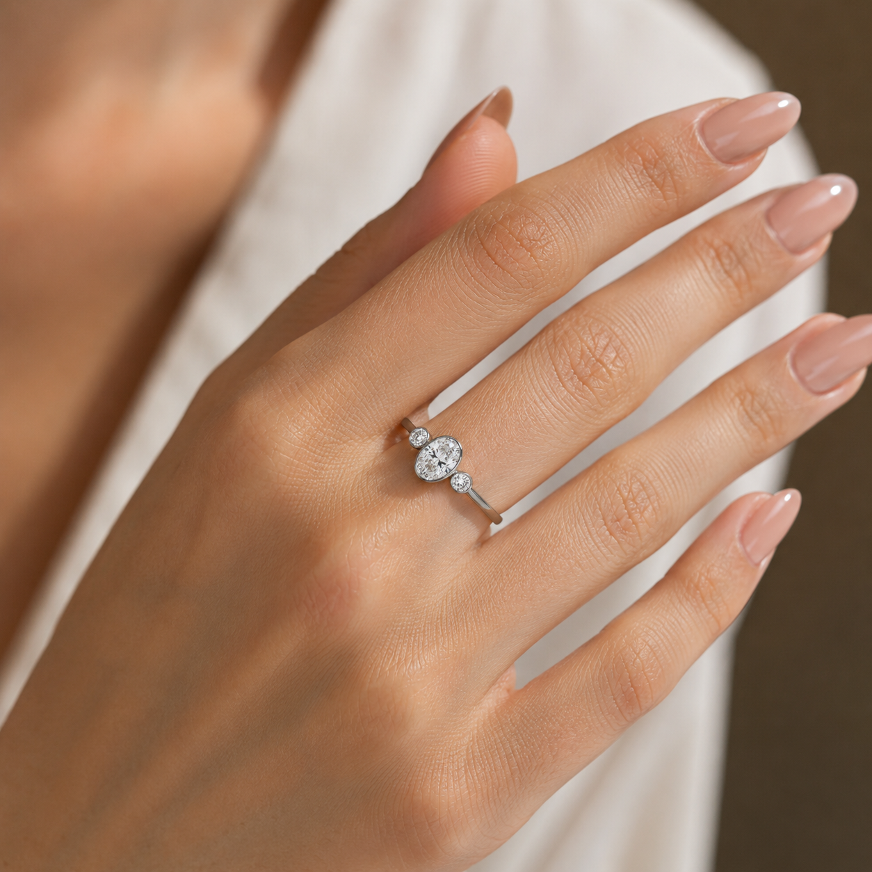 2.00 CT Oval Cut Lab-Grown Diamond Three-Stone Engagement Ring in 14K White Gold – Bezel Set Trilogy Design