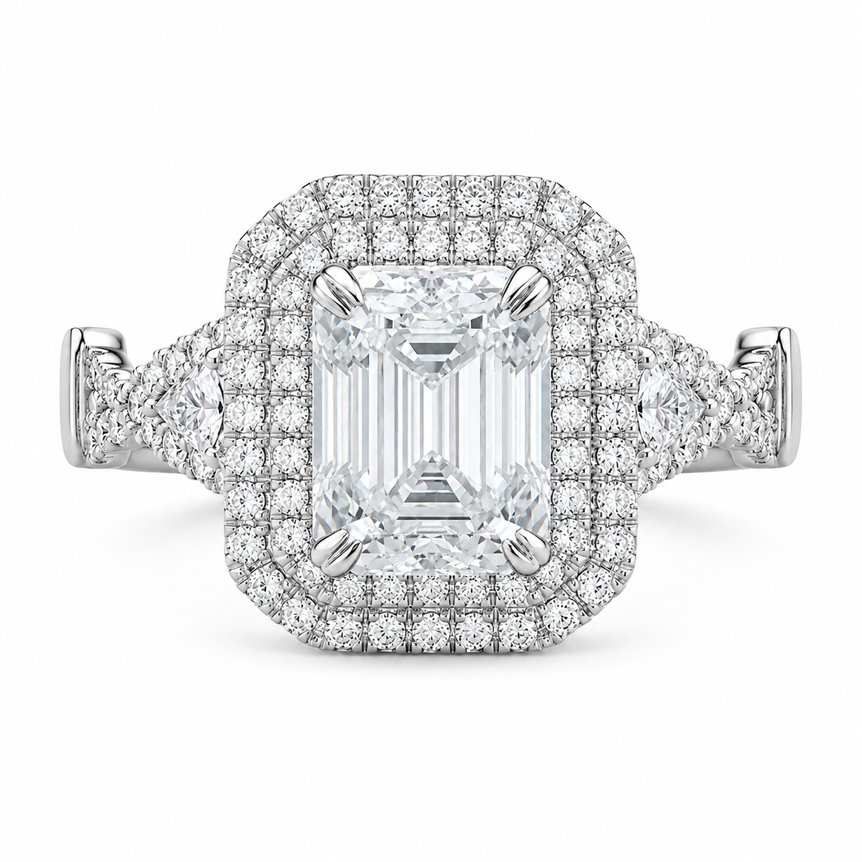 2.50 CT Emerald Cut Lab-Grown Diamond Double Halo Engagement Ring in 14K White Gold – Triangle Side Stone Twisted Shank Design