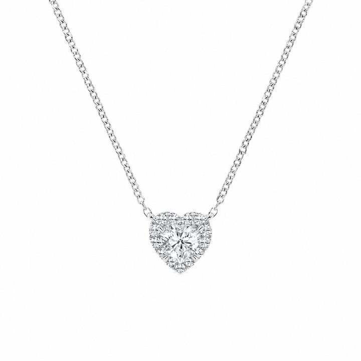 Heart-shaped diamond necklace on a white background