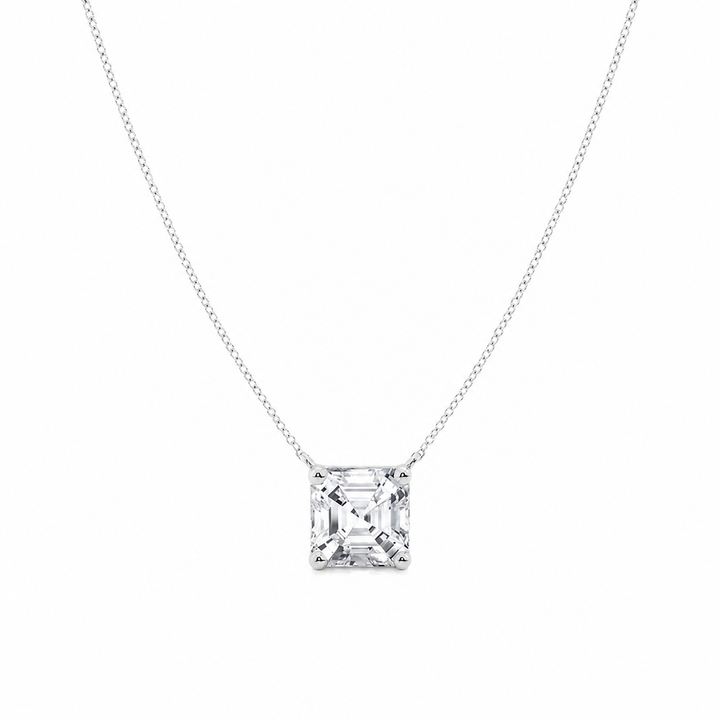 Diamond necklace with a square-cut pendant on a white background