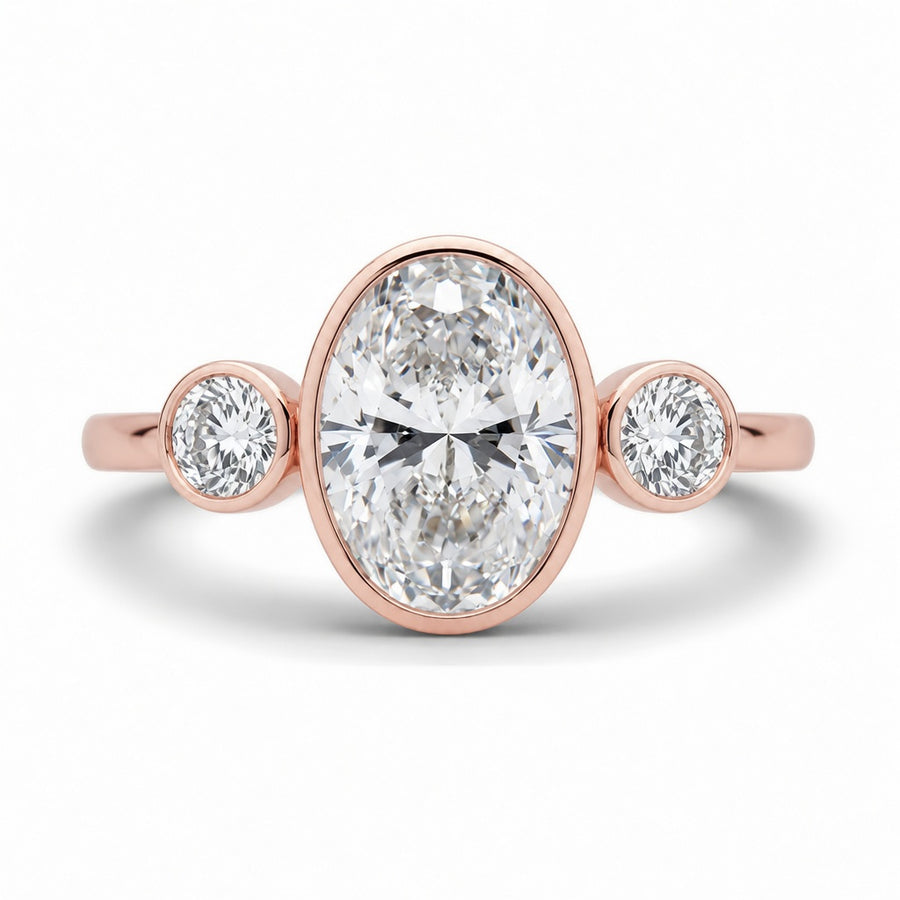 2.00 CT Oval Cut Lab-Grown Diamond Three-Stone Engagement Ring in 14K White Gold – Bezel Set Trilogy Design