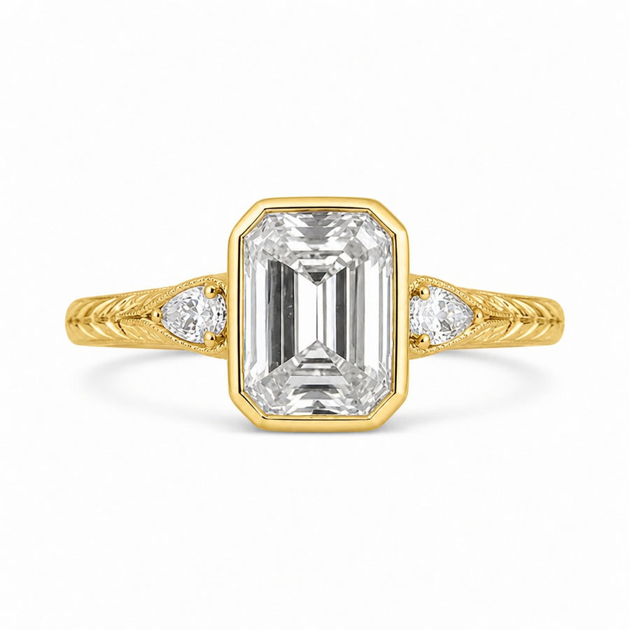 4.00 CT Emerald Cut Lab-Grown Diamond Three-Stone Engagement Ring in 14K White Gold – Pear Side Stone Bezel Trilogy Design