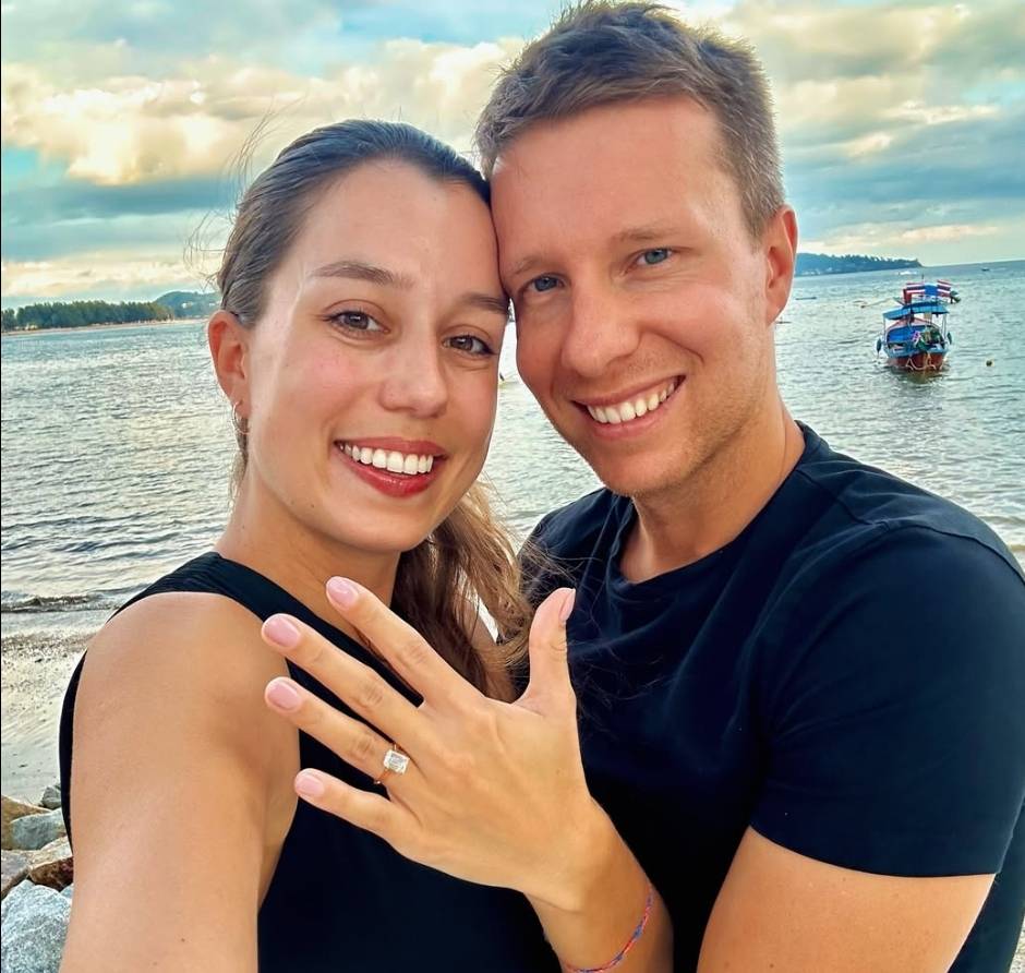 Happy couple engagement ring photo